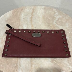 Michael Michael Kors studded Bordeaux wristlet